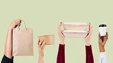 hands holding up single-use paper food packaging items_rawpixel via Magnific.png hands holding up single-use paper food packaging items