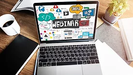 laptop that says webinar