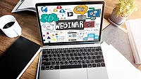 laptop that says webinar