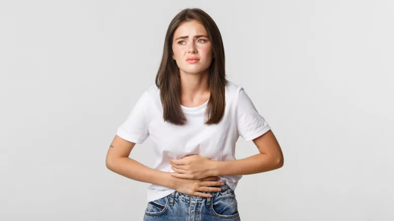 woman exhibiting GI discomfort