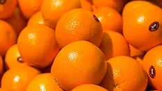 fresh oranges on display_James Yarema via unsplash.png fresh oranges on display