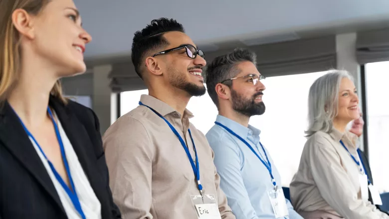 conference attendees listening to presentation